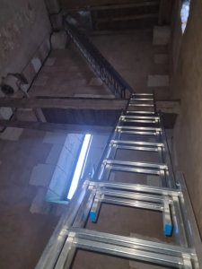 Remplacement des échelles du clocher de l'église de Perreuse